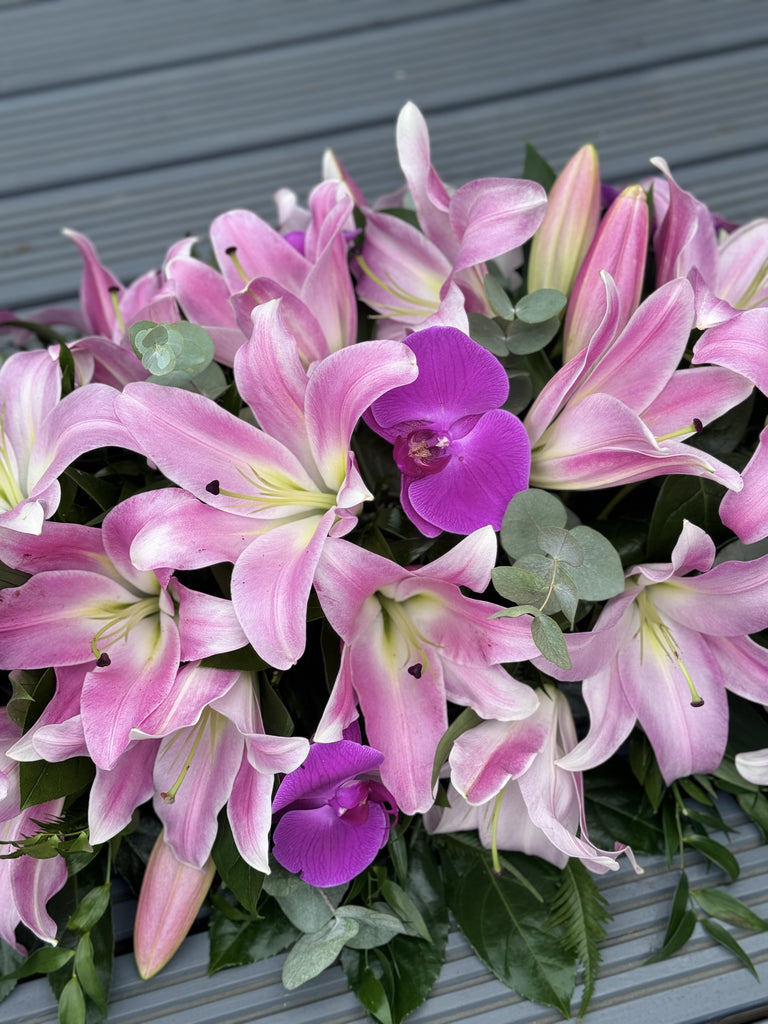 Elegant Pink Lilies and Orchid Casket Spray - Rams florists