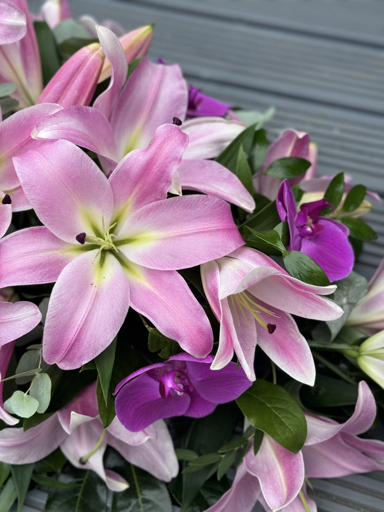 Elegant Pink Lilies and Orchid Casket Spray - Rams florists