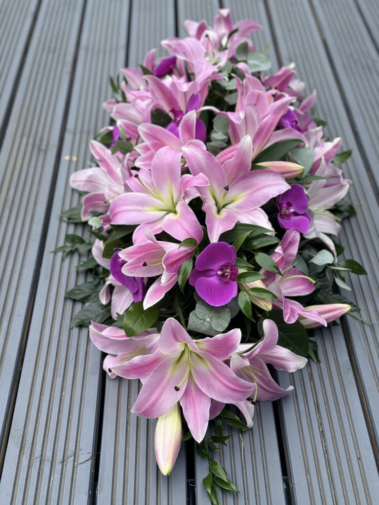 Elegant Pink Lilies and Orchid Casket Spray - Rams florists
