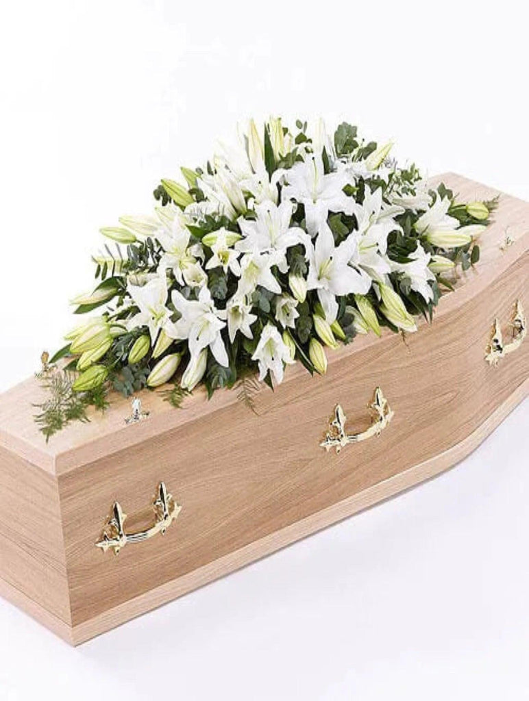 Oriental Lily Casket Spray - Rams florists