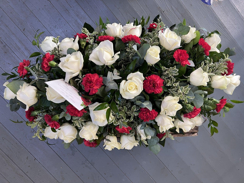 Rose and Carnation Casket spray - Rams florists