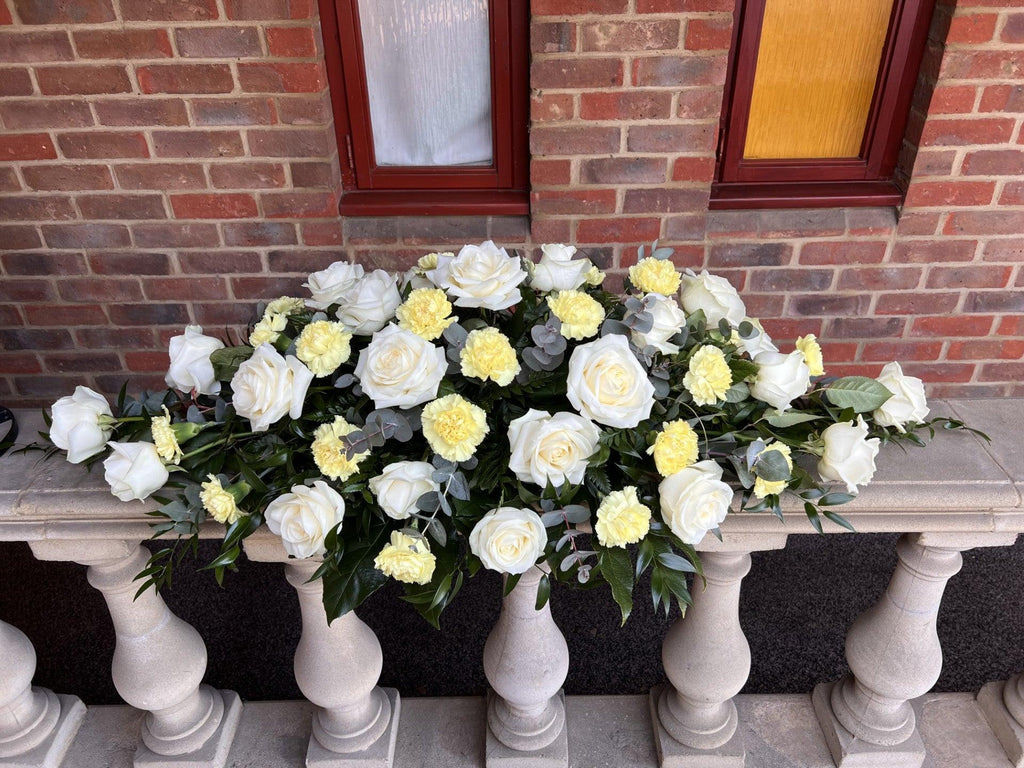 Rose and Carnation Casket spray - Rams florists