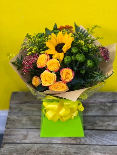Brights hand tied bouquet made with the finest flowers