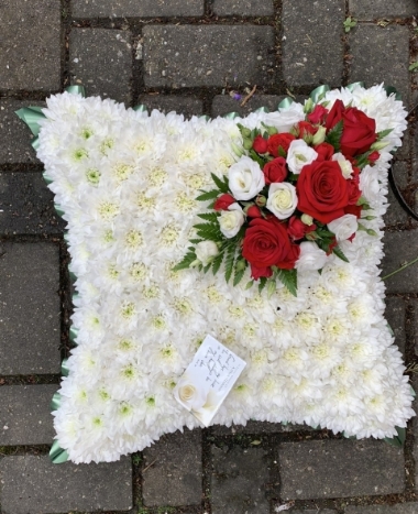 Cushion tribute flowers